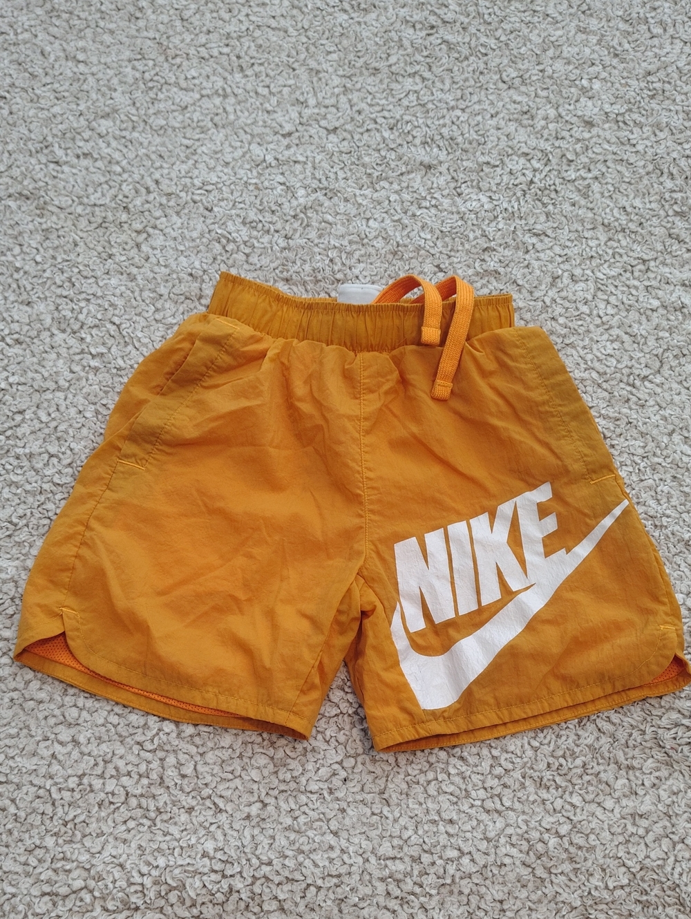Nike Kids Orange Shorts with White Logo